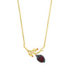 Branch shaped pendant necklace with a cocoa pod and flower buds, with red zirconia stones in gold vermeil